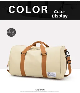 Detail of khaki canvas travel bag with durable brown handles and adjustable shoulder strap