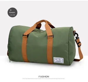 Detail view of the durable army green canvas travel bag with sturdy brown handles