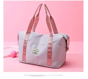 Close-up of light purple yoga fitness bag with side snap buckle and nylon texture