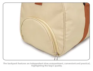 Detail of travel duffel bag showing a dedicated side shoe compartment with metal zipper