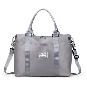 Large capacity grey travel bag with waterproof nylon fabric and adjustable shoulder strap