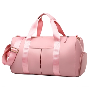 Pink waterproof large capacity travel bag with dry wet separation and adjustable strap