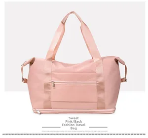 Rear view of sweet pink travel bag featuring back luggage strap and durable top handles