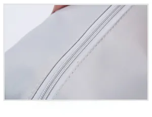 Close-up of the smooth zipper and durable twill fabric on the grey fitness travel bag