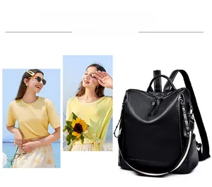Dettaglio dello zaino nero in pelle martellata con borchie laterali e design antifurto