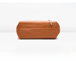 Detailed bottom view of brown crocodile texture tote bag with high-quality stitching