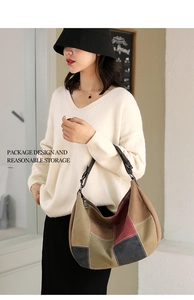 Detail of color-block canvas bag featuring adjustable leather strap and metal zipper closure