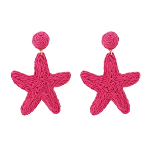 Handmade woven raffia starfish drop earrings in vibrant rose pink for summer beach style