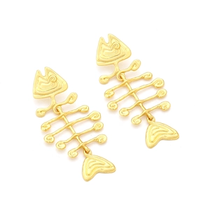 Long golden metal fishbone earrings with heart-shaped tail in minimalist ocean style