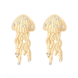 Golden jellyfish dangle earrings with sparkling diamonds in a detailed marine design