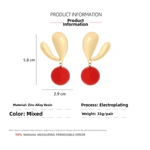 Detail view of heart drop earrings showing dimensions 5.8cm height and 2.9cm width