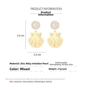 Boucles d'oreilles étoile de mer et coquillage doré avec perles et émail violet, 5,6cm