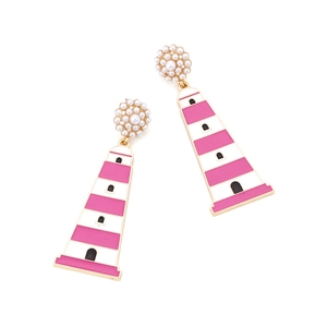 Close-up of lighthouse earrings with pink enamel stripes and white faux pearls
