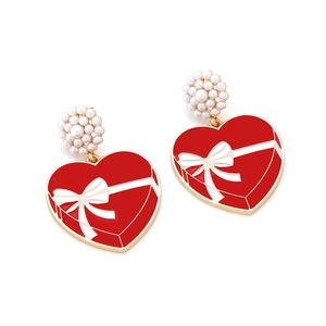 Red heart gift box drop earrings with pearl clusters and white ribbon bow accents