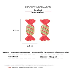 Detailed dimensions of candy-shaped earrings with red enamel and green rhinestones