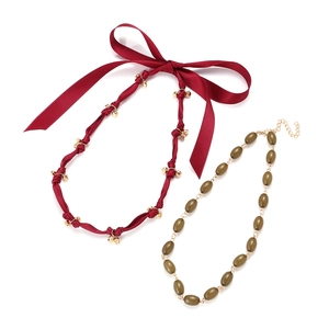 Handmade beaded olive green necklace and red satin ribbon choker with gold bell accents