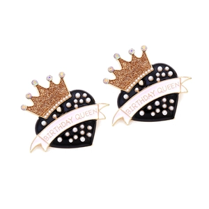 Black enamel heart earrings with golden glitter crowns and Birthday Queen ribbon text
