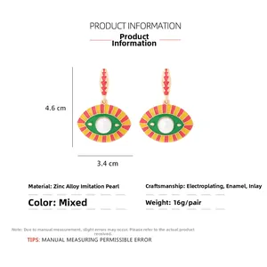 Detailed view of colorful evil eye earrings with enamel drip and size measurements