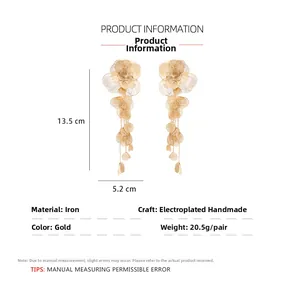Détails sur la taille et le matériau des boucles d'oreilles fleurs dorées en métal