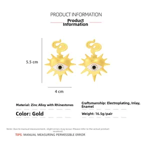 Detail view of heart-shaped evil eye earrings with dimensions 5.5cm height and 4cm width