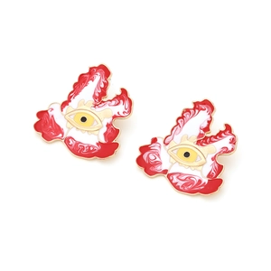 Detail of colorful enamel devil's eye stud earrings with gold plating and marble texture