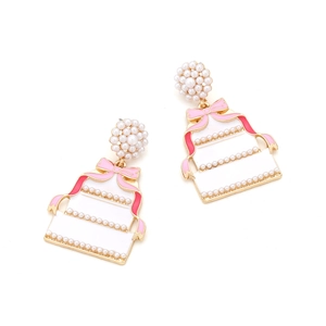 Sweet pink enamel layered cake earrings with pearls and ribbons in gold plating