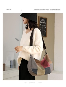 Detail of multi-color patchwork canvas crossbody bag with adjustable wide strap