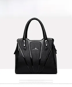 Front view of black lychee-textured leather handbag with metal kangaroo logo and handles