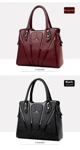 Detailed comparison of wine red and black leather tote bags with lychee grain texture