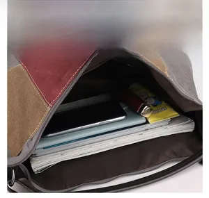 Macro view of canvas bag interior showing large capacity for laptop and daily items