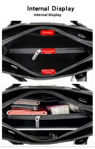 Internal display of black tote bag showing multiple pockets and large storage capacity