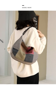Detailed model view of the oversized canvas hobo bag with colorful patchwork design
