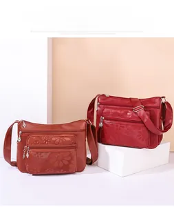 Détails de sacs bandoulière en cuir PU à poches multiples avec motifs gaufrés