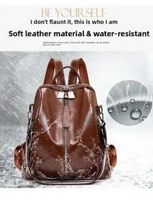 Close-up of waterproof soft leather backpack fabric with water splashes and texture detail