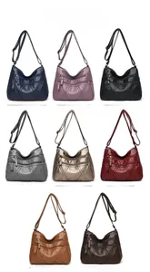 Multiple colors of lightweight soft PU leather crossbody bags with V-shaped stitching detail