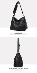 Detail view of black soft PU leather crossbody bag with multiple zippers and adjustable strap