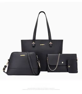 Detailed four-piece set of black faux leather tote, shell bag, clutch, and card holder