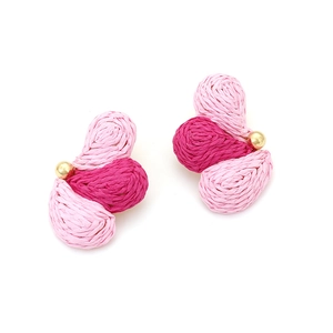 Detailed close-up of handmade pink gradient raffia fan-shaped earrings with gold bead