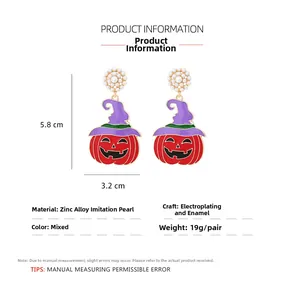 Λεπτομέρεια από σκουλαρίκια κολοκύθας Halloween με διαστάσεις 5,8cm x 3,2cm