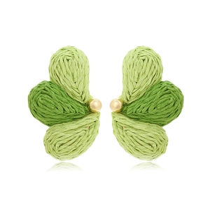 Handwoven green raffia fan earrings with gradient leaf design and golden bead accents
