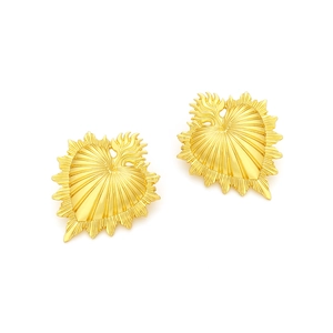 Textured gold sacred heart earrings with vintage embossed details and flame motif