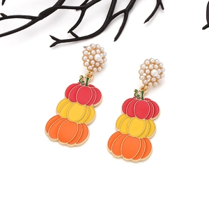 Boucles d'oreilles citrouille rétro Halloween avec perles blanches et émail orange