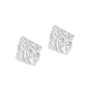 Silver geometric earrings with irregular crushed foil texture in minimalist style