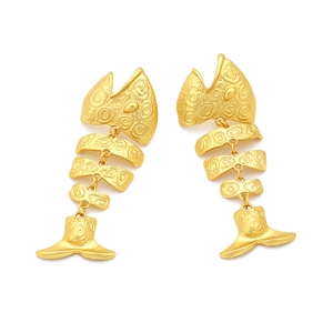 Matte gold fishbone earrings with textured segments and vintage nautical style