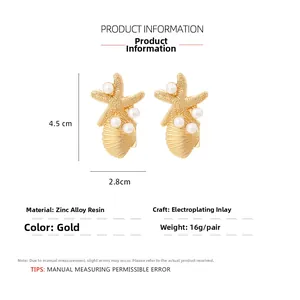 Détails des boucles d'oreilles étoile de mer dorées avec perles et dimensions de 4,5 cm