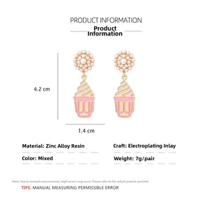 Detail showing dimensions of sweet cupcake and pearl flower earrings in pink and white
