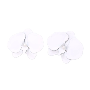 Detailed close-up of white orchid earrings with layered petals and center pearl accents