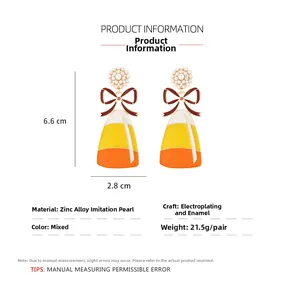 Detailed size specifications of Halloween candy corn earrings with bow and faux pearls