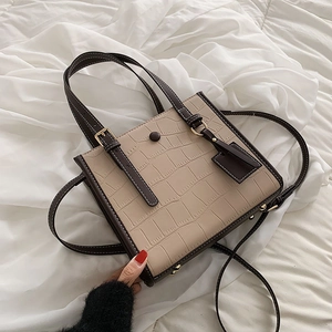 Minimalist faux crocodile stone pattern tote bag in beige with dark brown handle