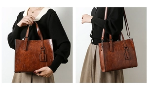 Détail du sac cabas marron vintage avec lettres embossées sur cuir synthétique brillant